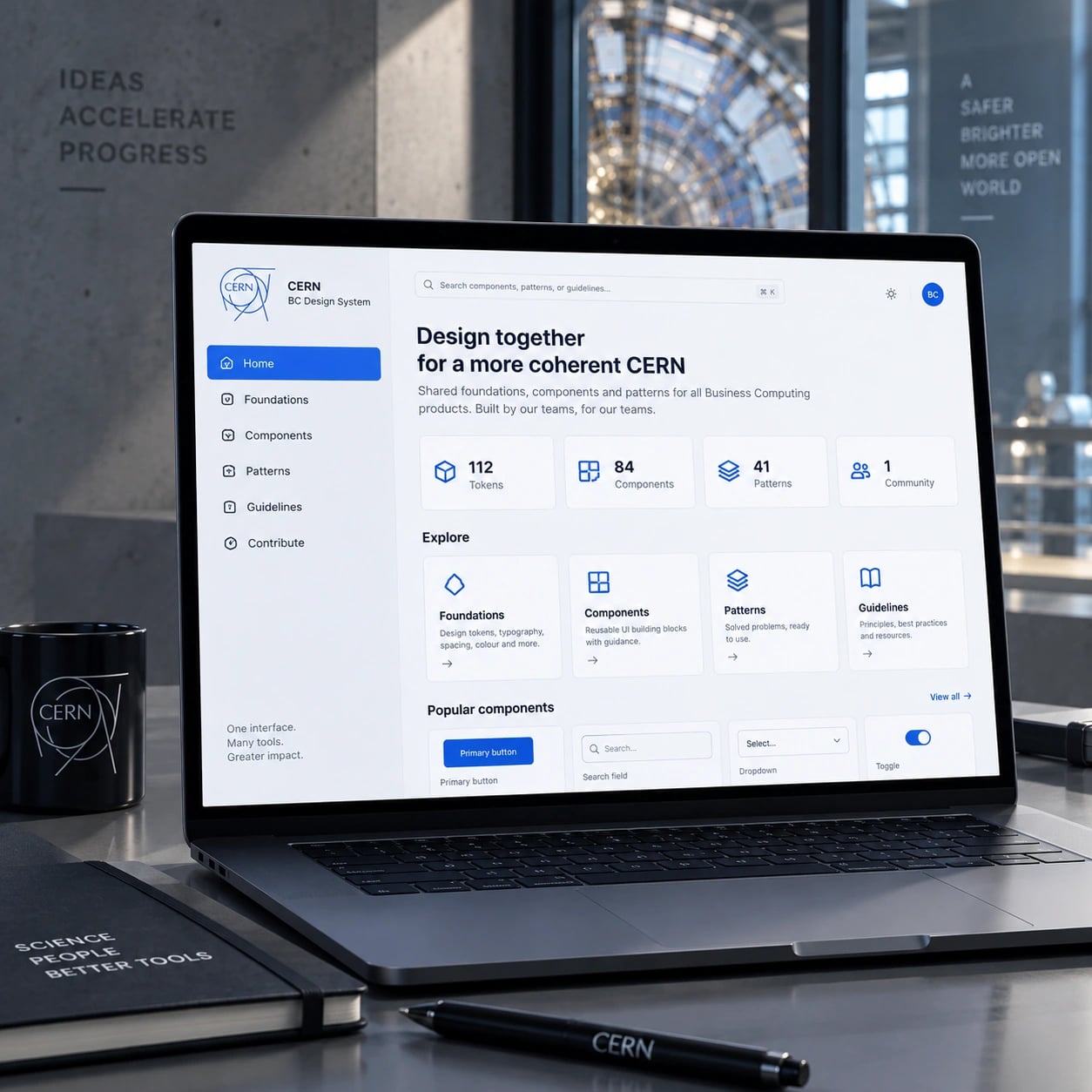The design system’s home page on a laptop: 112 tokens, 84 components, 41 patterns, one community.